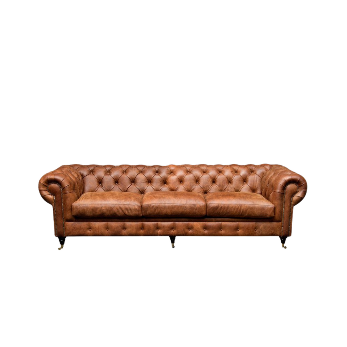Iconic Chesterfield Sofa – The epitome of timeless old-world charm, the Chesterfield sofa, with its tufted deep buttoning, stands as a symbol of enduring elegance. Crafted to your exact specifications, this iconic piece is custom manufactured in our premium leathers and fabrics, ensuring a touch of luxury tailored to your personal style.
