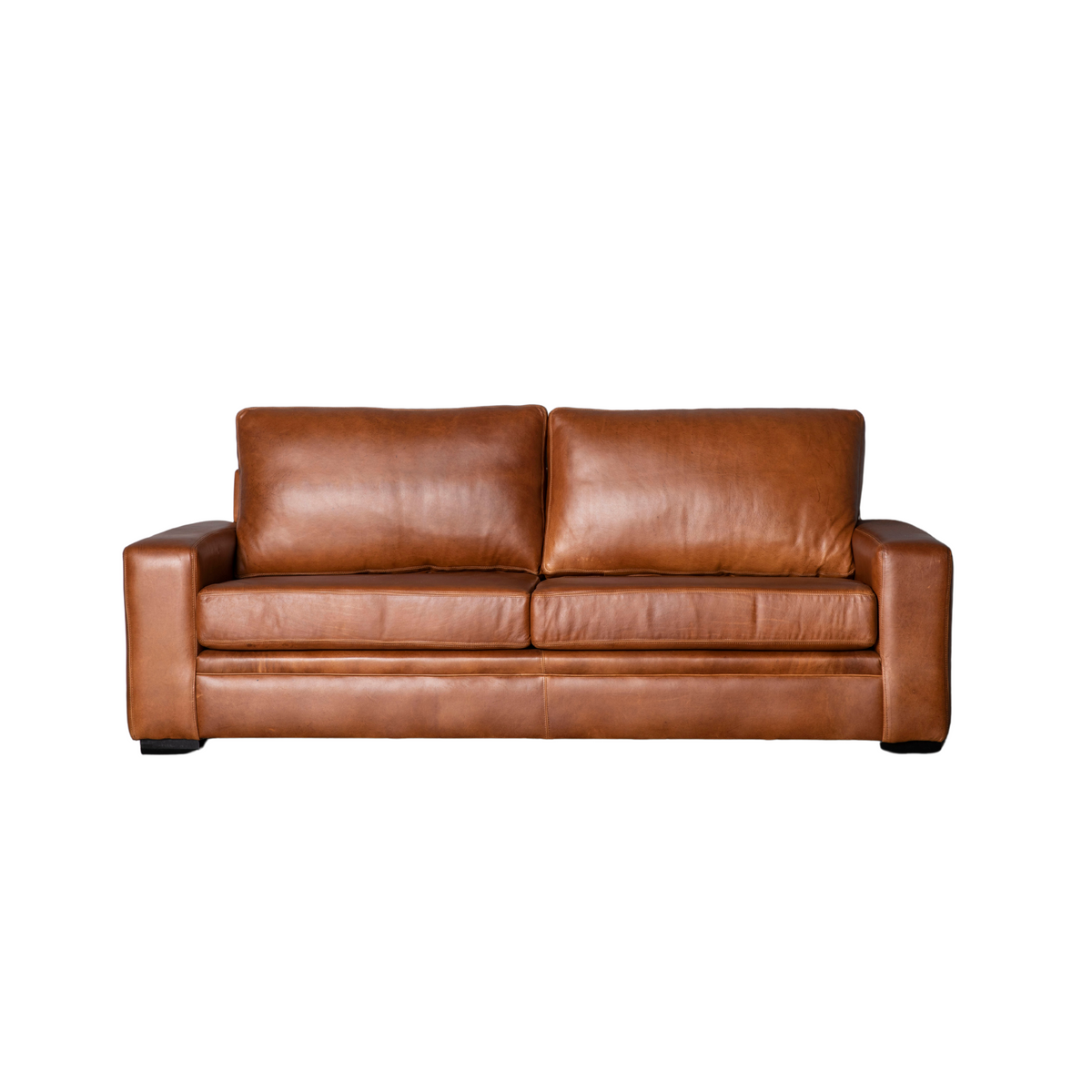 Manhattan Collection – Elevate your space with our versatile Manhattan design, available in Sofas, Daybeds, and Corner Units. Offering a relaxed feel with support in the seat and back, it's the perfect choice for various activities such as watching, listening, reading, or entertaining. Customize your experience with any size you desire and a wide range of premium leathers and fabrics, capturing your own personal style. Each piece is custom manufactured for a truly unique addition to your living space.