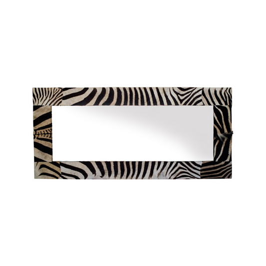 African-Inspired Burchell Zebra Mirror – Immerse yourself in the beauty of Africa with this distinctive Burchell Zebra mirror. Reflecting unique elegance, it is available in custom sizes and can be crafted with any hair-on hide, skin, or fabric of your choice.  Embrace the exotic touch of Burchell Zebra hides, with worldwide shipping options to bring this exceptional mirror to your space.