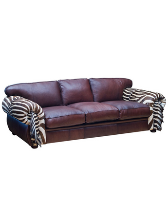 African Lodge Sofa in Burchell Zebra and Kudu Leather – Experience the essence of Africa with our African Lodge sofa, beautifully upholstered in Burchell Zebra and Kudu Leather. Transport the spirit of the wild to your living space.  International export of Burchell Zebra hides is available. Customize the sofa with your preferred sizes and materials, bringing a touch of African elegance to your home.