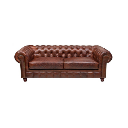 Iconic Chesterfield Sofa – The epitome of timeless old-world charm, the Chesterfield sofa, with its tufted deep buttoning, stands as a symbol of enduring elegance.  Crafted to your exact specifications, this iconic piece is custom manufactured in our premium leathers and fabrics, ensuring a touch of luxury tailored to your personal style.