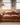 Cuba Sofa – Channel the ambiance of Havana's cigar lounges with the Cuba Sofa. Featuring a low-profile sprung back and soft-filled cushions, it offers the perfect spot for kicking back and chilling.  Tailor your space with custom sizes and your preferred premium leather or fabric, ensuring a personalized touch that captures the essence of relaxation and style.